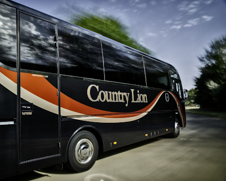 A Country Lion Coach on the road